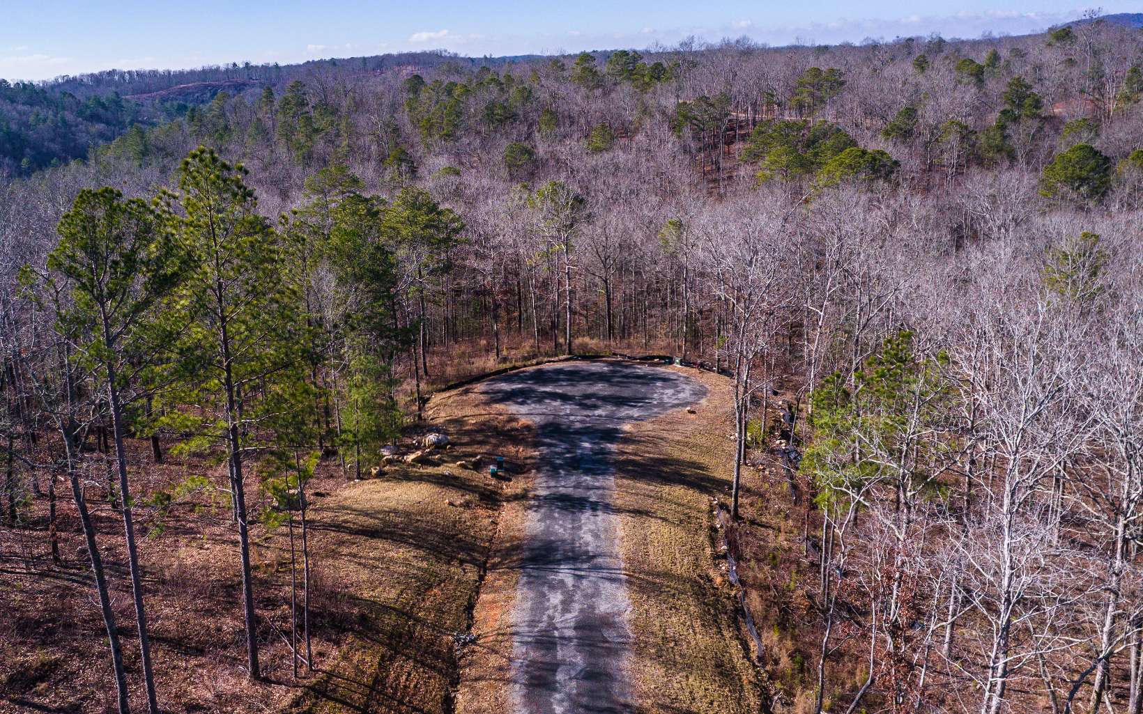 Enjoy the privacy and solitude on your very own 3.35 acres in one of Ellijay's newest communities of High River. This lot has river frontage and extreme privacy which is rare to find in a community with amenities. This lot is easy to build on with all paved roads and electric at the lot. All it needs is your plans and your builder! Enjoy everything High River has to offer including gated access, a community Lodge on Mountaintown Creek, Coosawattee River access, and Lake Lecroy fishing and picnic area. Only 15 minutes from downtown Ellijay, 10 minutes from Carter's Lake, and a short drive to anything else North Georgia has to offer!
