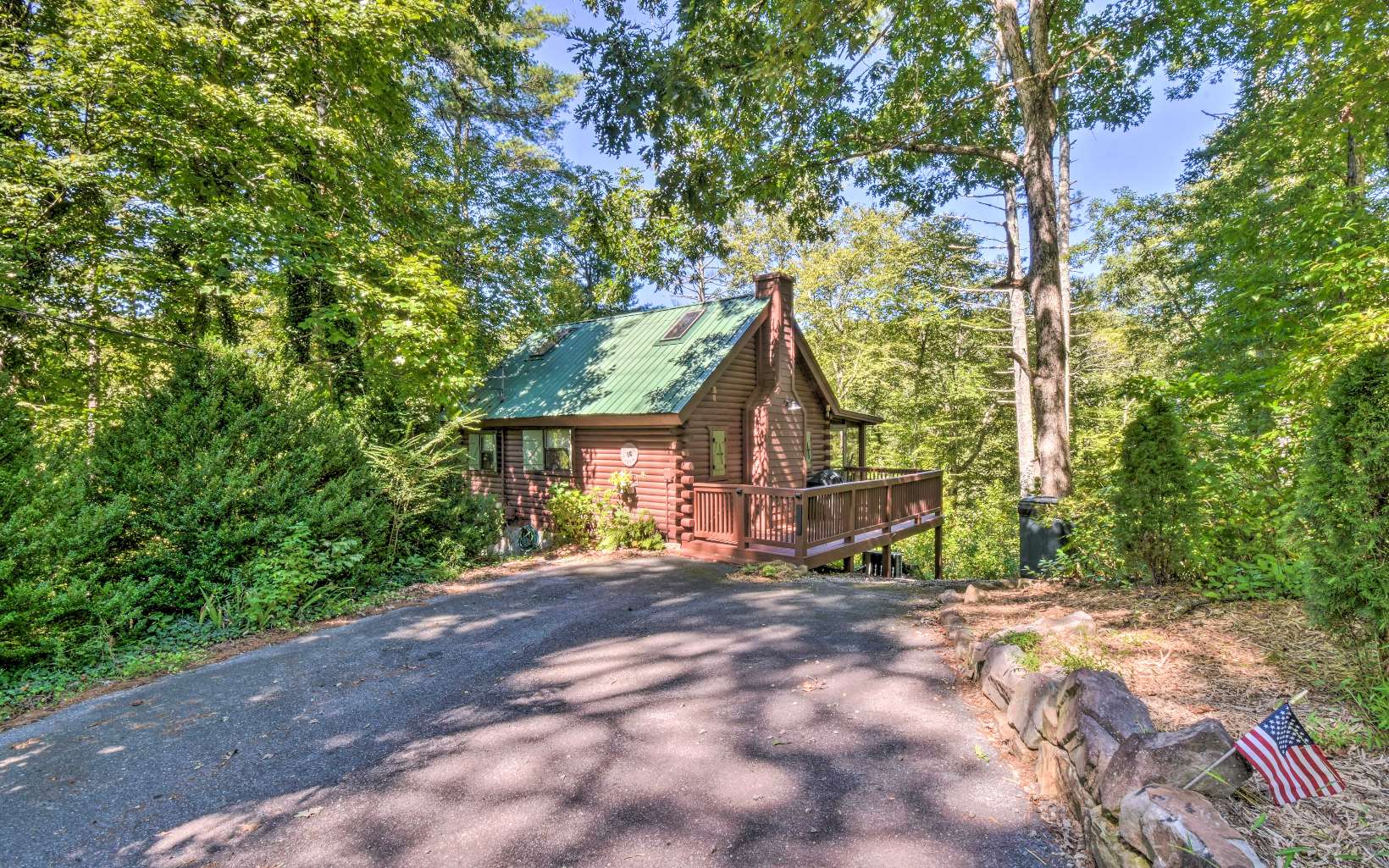 LOOKING FOR THAT NEXT INVESTMENT?!? You found it! Completely turn-key, you can be up and running on day one. There is absolutely nothing needed but you or your guests. The prime time for guests is here now through the holiday season. This gem gets you in the game now. It is a true log cabin in highly sought after Cherry Log / Blue Ridge area. Centrally located in the region with easy access to all corners. All paved access, just off of HWY76. Super convenient to Downtown Blue Ridge, Lake Blue Ridge, Toccoa River & Aska Adventure Area! This cabin embraces the open living concept and just feels like home when you step into the great room with vaulted ceilings, hard wood floors & stone fireplace. You can enjoy your morning coffee on the screened porch or on the deck and enjoy the peaceful surroundings. Lower level boasts a hot tub, & large crawl space that is perfect for storage and outdoor "toys". Cozy fire pit is also located in the back yard for those evening s'mores. Private wooded lot. Come get your slice of heaven or your next investment adventure!