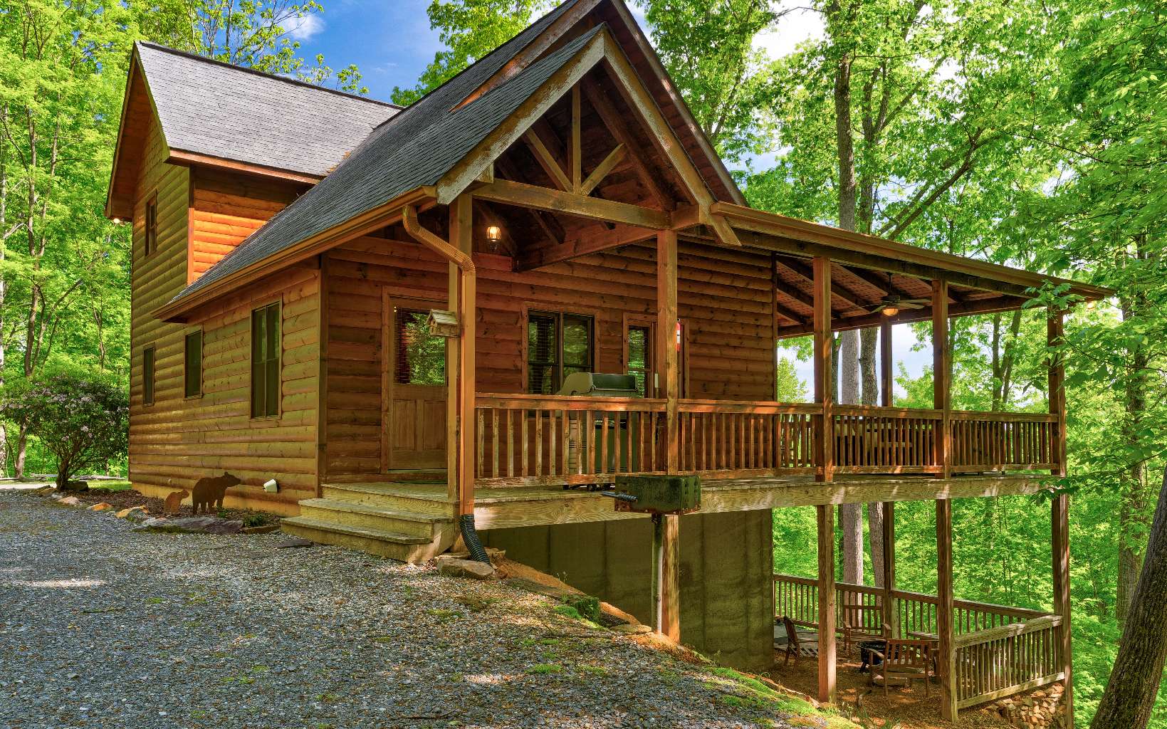 "Sweet Seclusion" can be yours!! Privacy and seclusion yet close to all outdoor amenities, shopping and dining of both Blue Ridge and Blairsville! Located just 20 min to both the Toccoa River or Lake Blue Ridge, this 3/3 gorgeous cabin not only offers privacy but with an open floor plan, spacious great room w/ soaring stacked stone fireplace, 2 masters including an upstairs master suite w/private balcony, custom live edge wood countertops, hardwood flooring, finished basement w/tiled flooring, laundry on main level, oversized deck to take in the mountain view and more, this one is sure to have you calling your favorite agent to book a showing today. Sold turn-key ready for you and your toothbrush!! If you are looking for an investment rental, full time in the mountains or charming second home, this one is ready for what works best for you!! Schedule your showing today!!