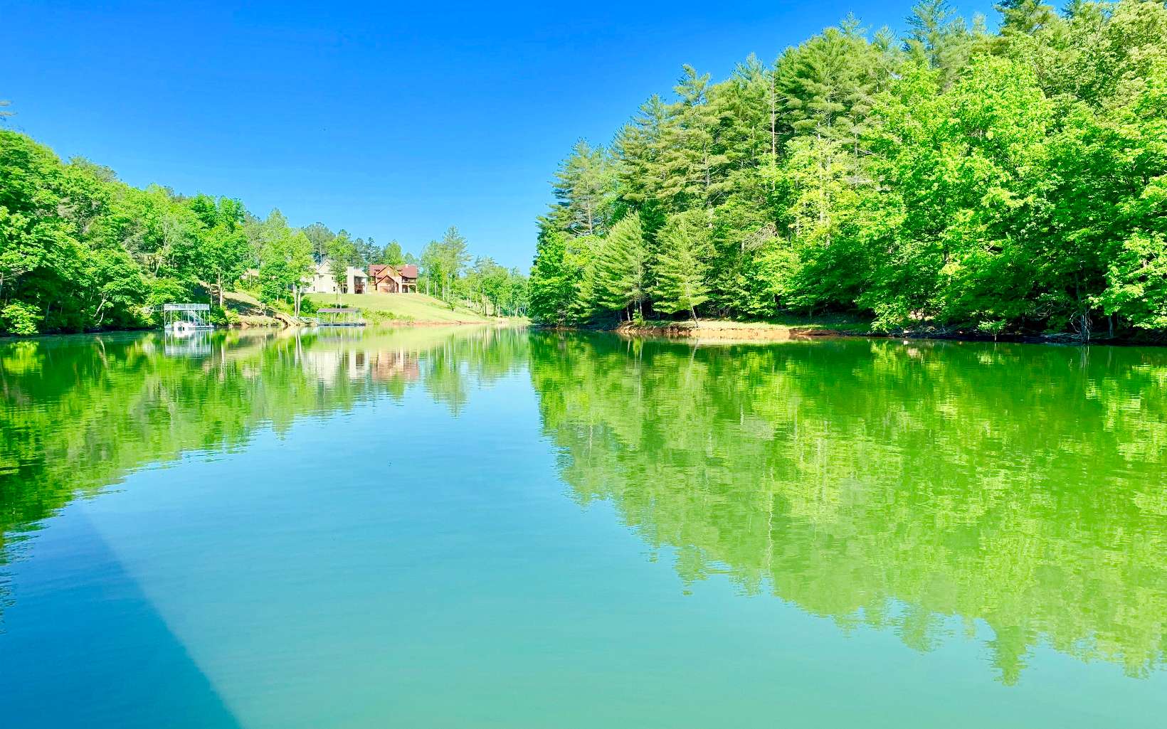 "LAKE FRONT LOT" Are you ready for true paradise located in the beautiful N Ga Mountains? Come & check out the prestigious & sought after mountain community of THIRTEEN HUNDRED ON LAKE NOTTELY. Great buildable lot sitting in a quite cul de sac. The amenities are some of the best around. Gated entrance, all paved access, beautiful lodge clubhouse with out of this world mtn views, saltwater pool, FP, bar, picnic area with grills, lake access & marina with multiple community boat slips, pavilion, fire pit area, swing, barn/stable w/small pasture, exercise area. Thirteen Hundred IS THE PLACE to call home in the MOUNTAINS. Convenient to Blairsville, Blue Ridge and Murphy NC