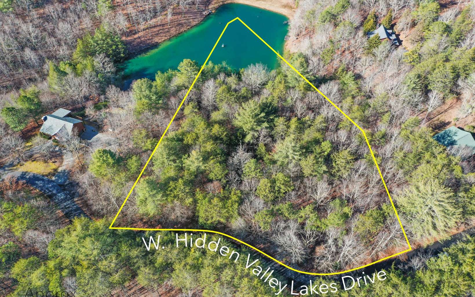 PRIVATE GATED COMMUNITY WITH LAKE FRONTAGE... 185 pristine ac S/D with 4 lakes. All paved access city water available, underground utilities and mtn views in private forestry setting! Gentle laying 2.51 ac lot w/ generous lake frontage. The possibilities are endless w/ this lot. No 4x4 needed, under 5 miles to downtown McCaysville and secure neighborhood!