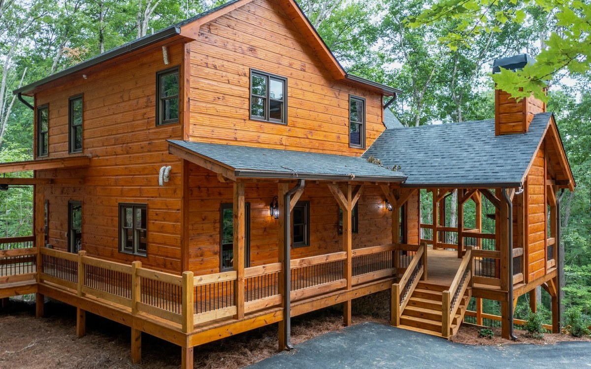 Gorgeous New Construction Cabin in Necowa Cove! Located in the Highly sought-after Aska Adventure Area. Just Minutes to Downtown Blue Ridge. Great established neighborhood with access to the Aska Trail System for hiking and mountain biking within 2 miles. Public boat Launch to Lake Blue Ridge and access area to the Toccoa River are within minutes. Seasonal View of the Mountains and Lake! Three Main Bedrooms, one on each level. Open Living/Kitchen/Dining Plan. Basement level Living Room/Game Room. Outdoor Fireplace on covered Porch. Separate Hot Tub Porch! Custom Cabinets, Granite Counter Tops, Separate Shower and Bathtub. Lots of elbow room and storage, premium T&G Interior with Bark accents. Paved roads. Short-Term Rentals are OK