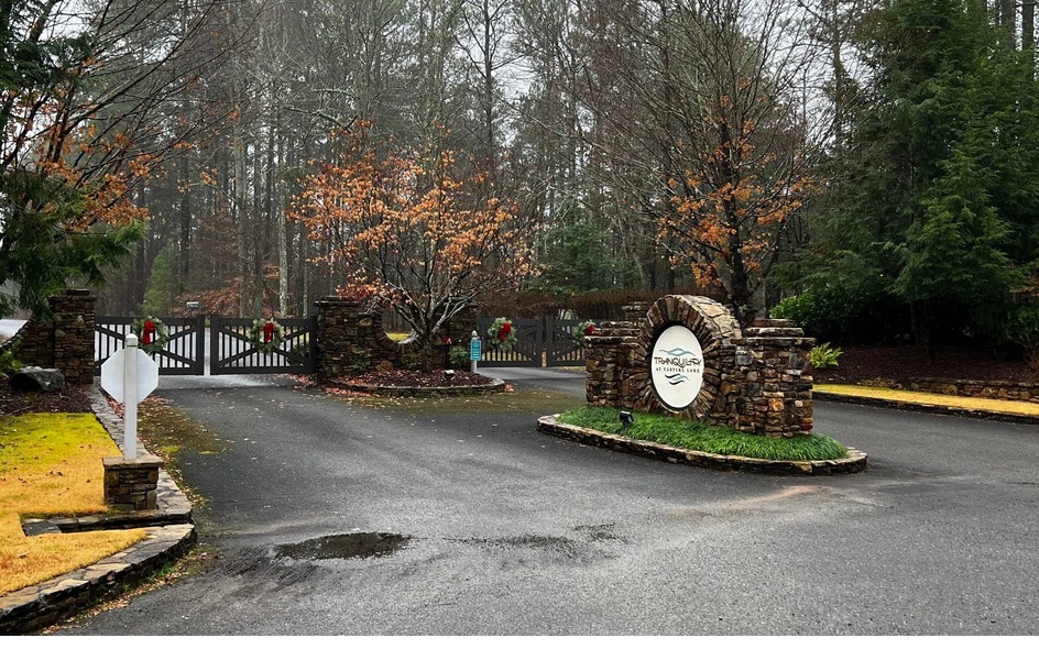 BUILD your Custom Dream Home in the exclusive community of Tranquility at Carters Lake. This uniquely “Flag” shaped, 1.75 acres of gently level home site offers seasonal Southern Appalachian Mountain views. Enjoy boating, fishing, skiing, and swimming, while discovering the 3,200 acres of Carters Lake sparkling water, or hike the surrounding forest and streams, all from your “back yard”. This dream home site is less than 1 mile from Carters Lake boat ramp and Doll Mountain Camp Ground boat ramp, minutes from the quaint mountain town of Ellijay, the Appalachian Trail, and National Forest, while only 70 miles from Atlanta. Tranquility Park is located inside the private gated community. This creekside park offers a grand “Craftsman” styled pavilion, pick-nick shelters, playground, and grills for your family gatherings and events. The Tranquility lifestyle is developed around a “Rustic Sophistication”, where the architecture and building materials compliment the natural setting. Underground utilities, public water, and winding paved roads are calling your name.