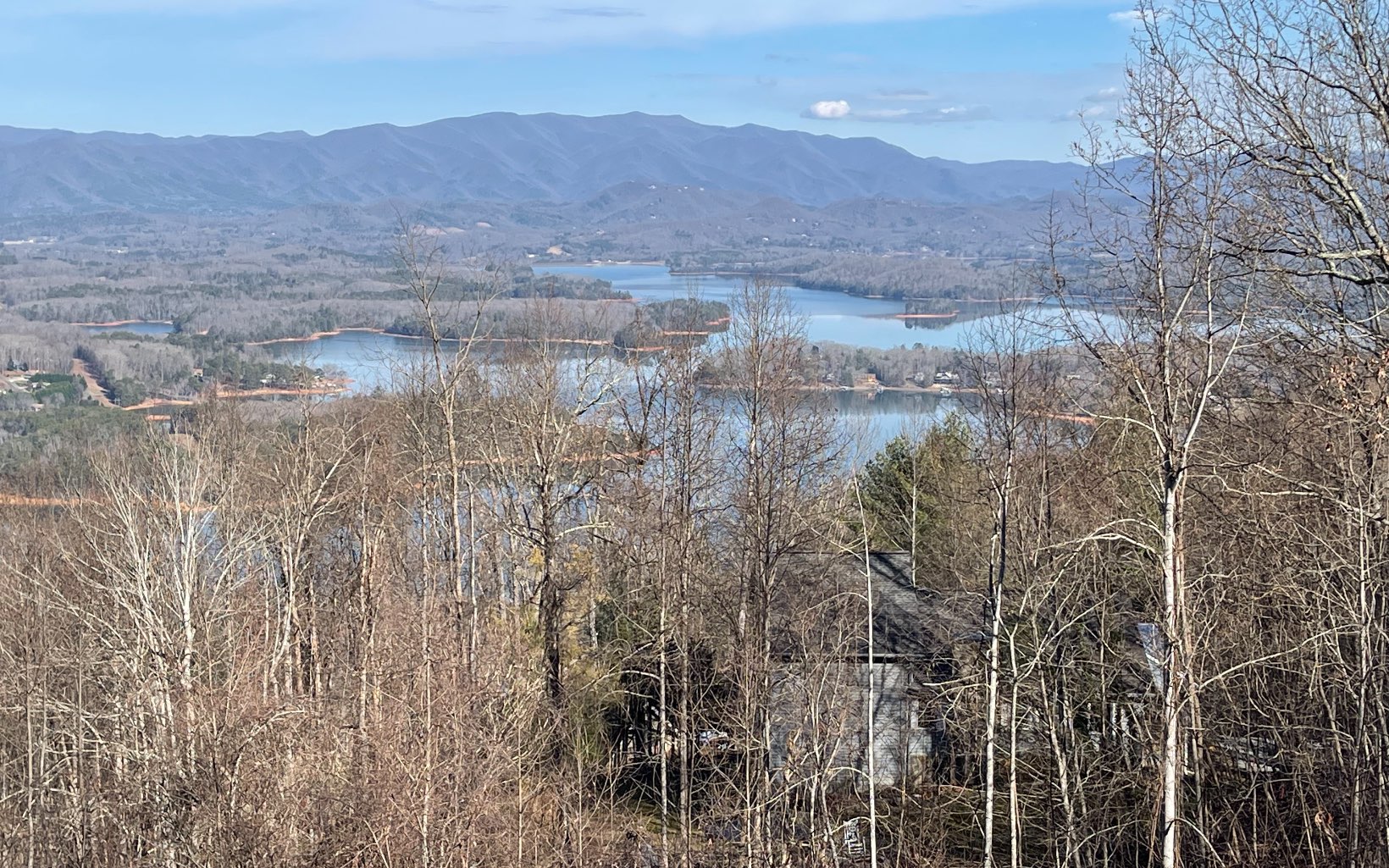 SPECTACULAR VIEWS LAKE CHATUGE & SURROUNDING MOUNTAINS! Located in the North Georgia Mountains in a well established subdivision, this lot offers awesome views, county water and underground utilities. The perfect location to build your mountain retreat!