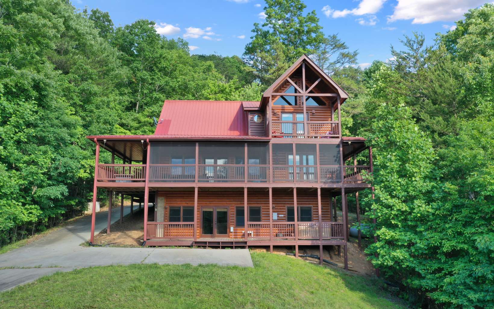 Bring All the Family or your Favorite Friends to this Gorgeous Cabin in the North Ga. Mountains situated on one of the highest peaks around. 3 BR/ 3 BA Log Sided Cabin with a Long-Range Mountain View (Improved with a small amount of tree topping). All paved access & less than 15 minutes to downtown Blue Ridge, Blue Ridge Lake or the Toccoa River. Huge screen porch on the view side, wrap around porches, metal roof. Master offers a private porch, fireplace, spacious master bath, jetted tub & tile shower & double vanities. A mini split system for added comfort. Actually, you could have 2 masters no problem. The lower-level game room & the living area on the main floor are very accommodating for several people to gather. Prepare your meals while enjoying the mountain view, then sit at the separate dining area, same great view. On demand hot water, Plenty of parking here, circle drive + det. garage.