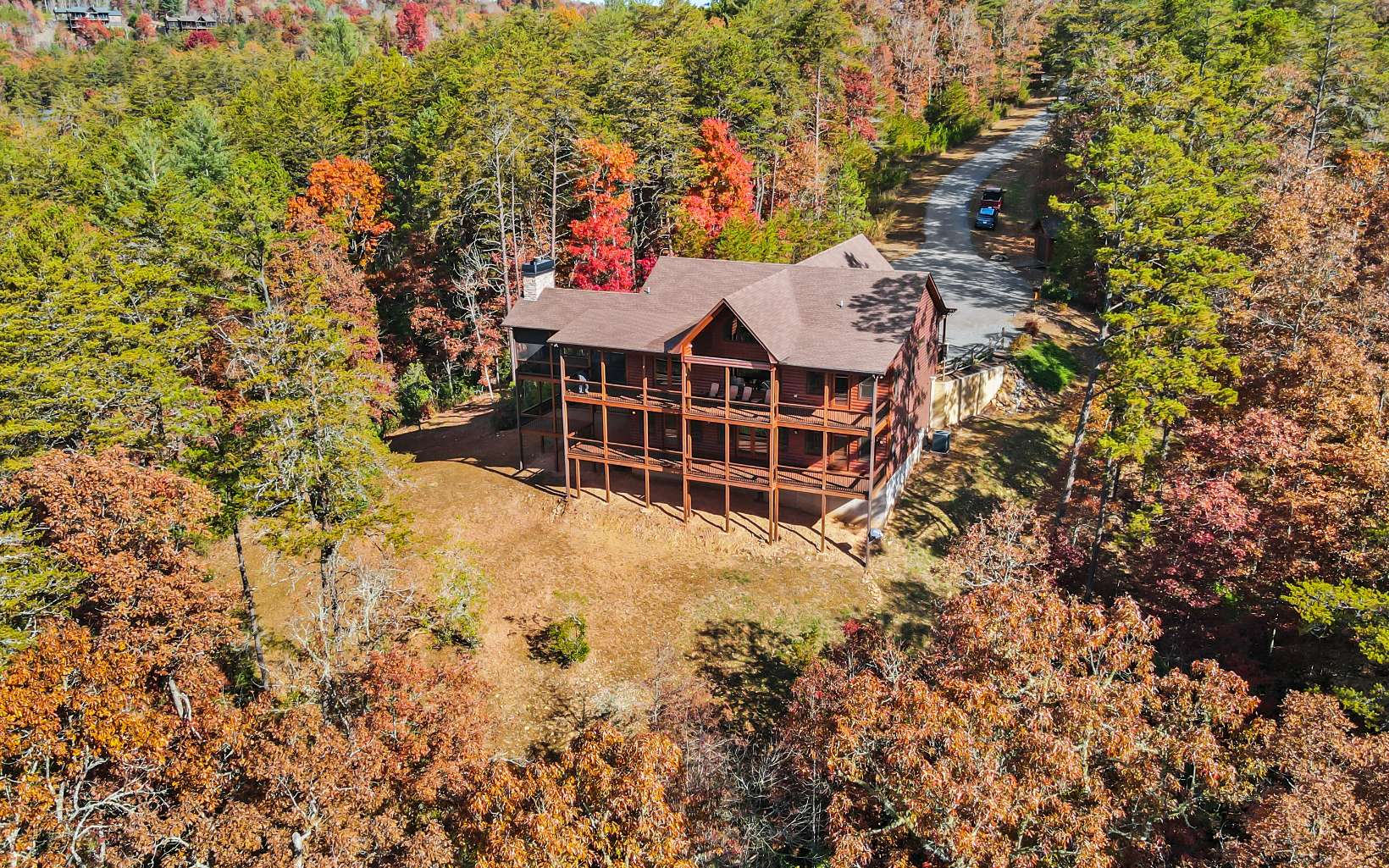 This Gorgeous 4 bedroom and 4 1/2 bath pristine mountain cabin sits on 5 beautiful acres in the Gated Community of The Highlands. Turn-key & gorgeously furnished home offers over 3200 sf under air and so much more. Enjoy morning views with coffee on your wrap around decks. Great space for entertaining on the outdoor decks with wood burning fireplace or outdoor living area. Open floor plan with spacious kitchen, Stainless appliances & granite throughout. Custom cabinetry & custom tile finished with 3 stacked stone fireplaces. Relax & take in all of the year around mountain views in great room with wall of windows and floor to ceiling stone fireplace. Master Suites on all levels as well as laundry rooms and wet bar. Private setting at end of cul-de-sac with 2-car portico and wonderful workshop with power. Too many features to mention! This home is turn-key & ready for your forever home or to be your investment property.