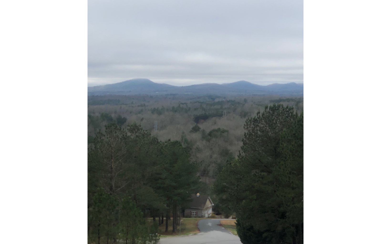 Gorgeous year round MOUNTAIN VIEWS ON A CORNER LOT in upscale community, near marina & Lake Nottely. Close to town, public golf course and Murphy NC. underground utilities, county water, and paved roads with curbing. This is a beautiful lot for your dream home.