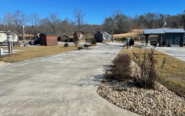 Incredible community atmosphere. Potential to build a tiny home or park your RV. Amenities include tennis/pickle ball courts, pool/hot tub, laundry mat, club house, fishing at the pond, golfing, biking, giant chessboard, dog park and a spa/fitness center all with a mountain view. Call today to see it for yourself! Gate Code needed.