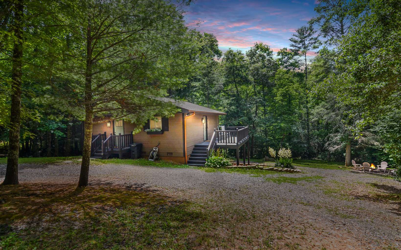 Recently updated TWO UNIT cabin. This investment property is a 4 Bedroom, 2 Bath. Each unit has 2 bedrooms, 1 bathroom, a kitchen and living room. Private deck on upper level. Private porch on lower level. Firepit. Freshly painted inside and outside. New Flooring. New hot tub. Small stream at bottom of the property.