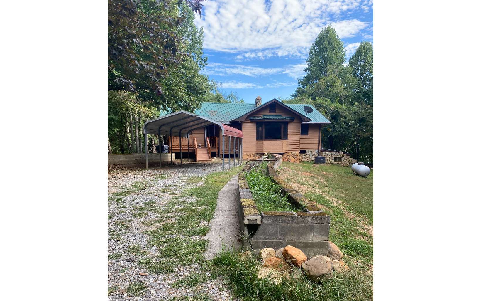 Acreage and privacy. If you want to get away from the city life, this is it! 7.6 ac. with beautiful woods, privacy, and a large pond. Great possibilities, Great neighborhood and close to good fishing, hiking and outdoor enjoyment. Located near Blairsville, Blue Ridge and Murphy N. C.