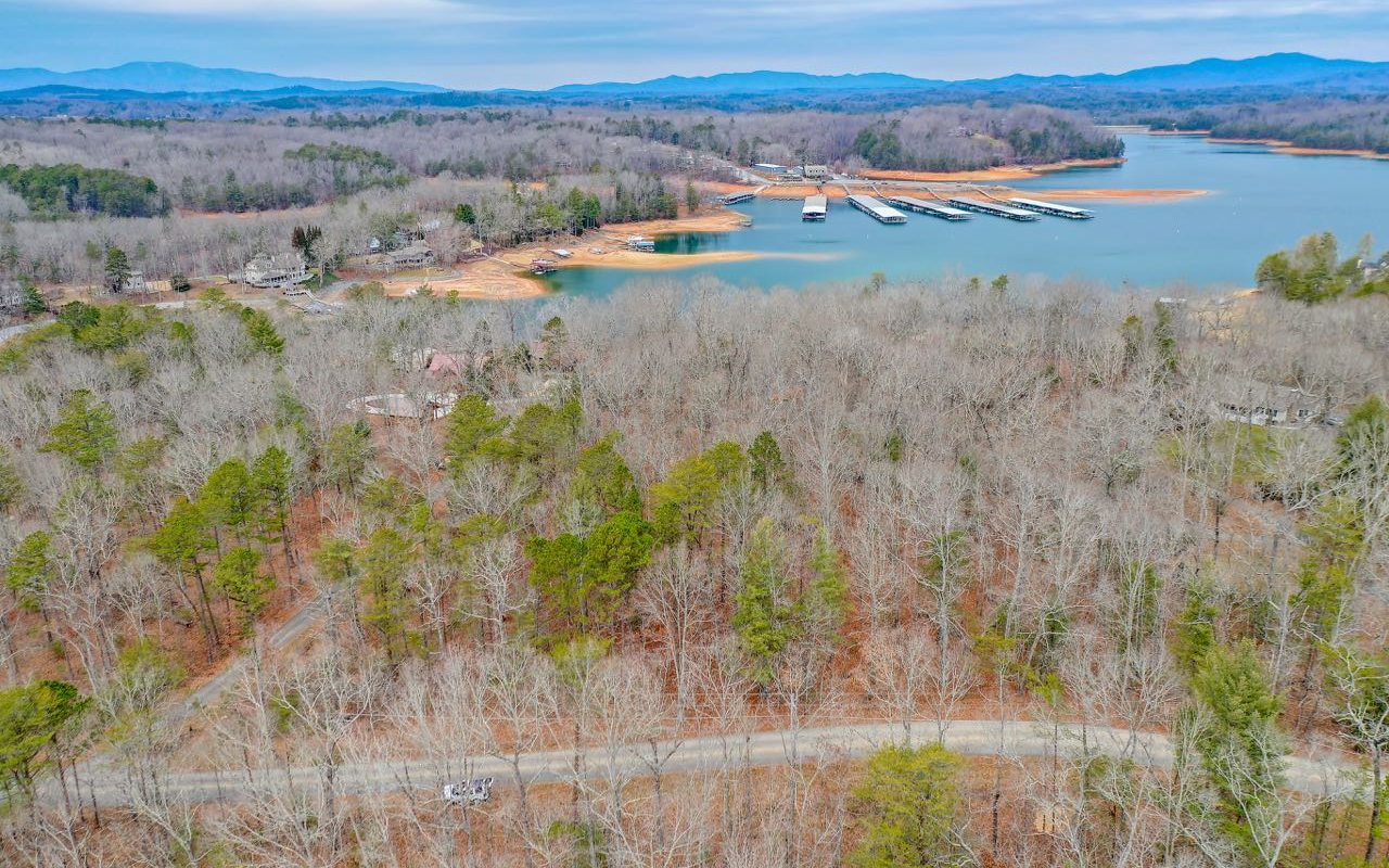 Incredible opportunity to own large parcel on Lake Blue Ridge with 180ft of lake frontage. Build, subdivide or just hold one of the last great pieces on the top end of the lake. Utilities, everything is available! Owner financing available. Call list agent for more info.
