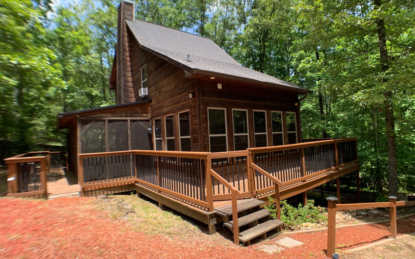 CHARMING MODERN RUSTIC CABIN on 3.1 acres, unrestricted. Great location with plenty of privacy. Custom built in 2012, updated with new paint & furnishings available on a separate Bill of Sale. Large 24x16 out building for storage/workshop or bunkhouse/game room. Wrap around deck, screened in porch, Master BR Balcony, extra sleeping area could be 3rd bedroom, outdoor fire pit area. Close to Lake Nottely & conveniently located to Blairsville, Blue Ridge & Murphy, NC.