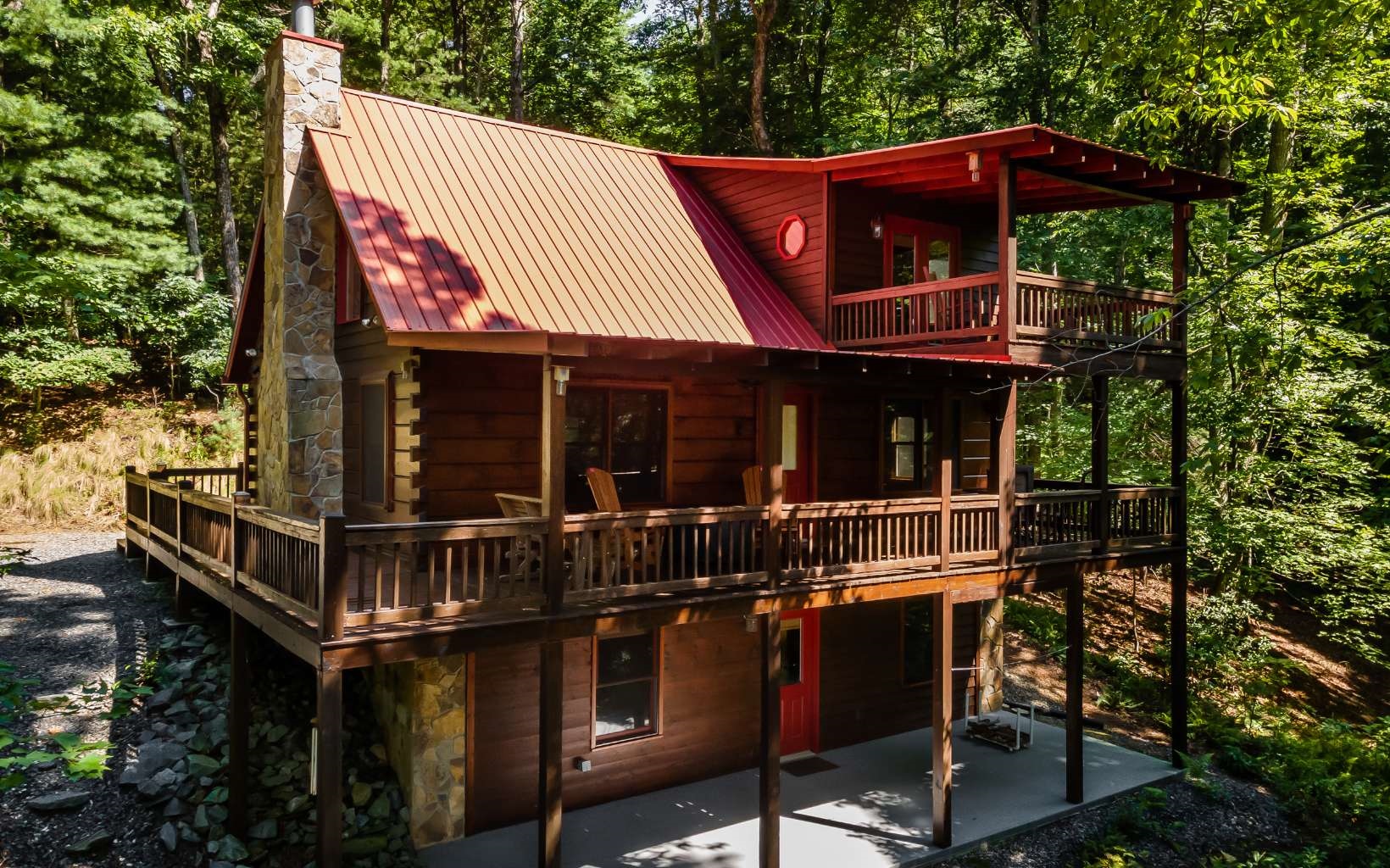 This Meticulously maintained “True Log Cabin” mountain get-a-way located in the Aska Adventure Area offering seasonal mountain views of an abundance of natural beauty that can only be seen in the Blue Ridge Mountains is now available! This picture-perfect 3BR/3BA/Loft plus finished basement Mountain Get-a-way offers split-rail fencing along the driveway & parking area, a flagstone rocked wood burning fireplace in the spacious main floor great room & a ventless gas log fireplace in the terrace level family room; lovely pine tongue & grove interior walls & cathedral ceilings and immaculate pine flooring; private porch off the upper-level master BR, main floor Living room & terrace level family room (perfect for adding a hot tub). Now Showing, your new mountain home!!