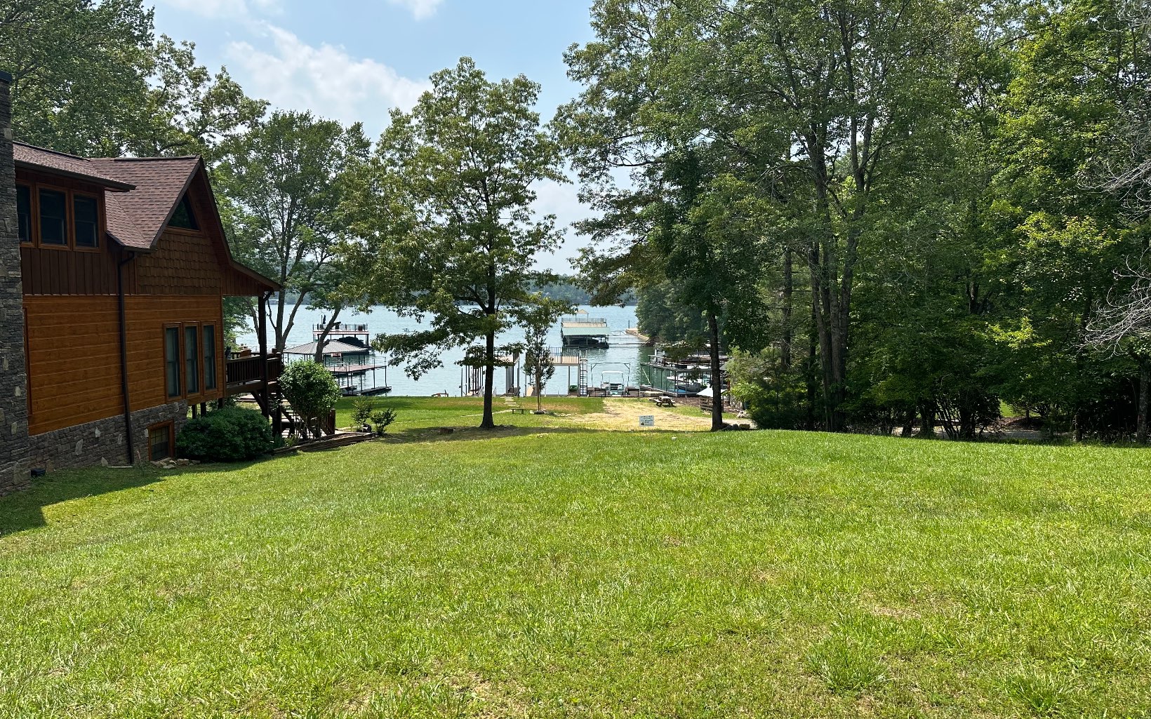 DEEP WATER LAKE LOT!! Build your dream home on over a half acre Lake lot that has water and Septic in Place. The lot is very gentle and easy to build on. It has it's own set of steps to get onto the dock that is coming soon.