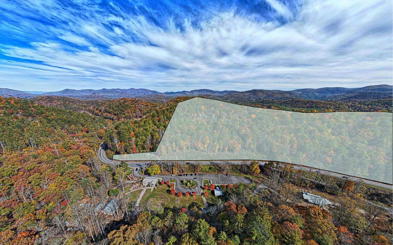 Great investment opportunity, approximately 15.26 acres that is the biggest part of Vogel Vista subdivision and already divided into over lots. A road circles through property and electric is already there. Lots of ridge top, mountain laurel and wildlife. Very close to Vogel State Park.