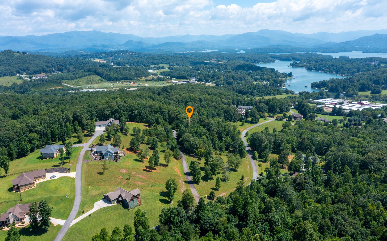2 LOTS IN THE NORTH GA MOUNTAINS IN GATED COMMUNITY WITH POOL, TENNIS COURT & CLUBHOUSE!! Searching for the perfect property that checks ALL the boxes? Look no further!! Breathtaking, cascading layers of long range mountain and lake views await once you begin clearing for your dream mountain home. Location is absolutely unbeatable. Centrally located in an upscale, gated community in Young Harris and just minutes from the main highway. Wide paved roads, stellar views of both sunrise and sunset, community pool & hot tub, fiber optic internet, clubhouse, and tennis/pickleball courts. Long, paved road leads back to property tucked away in its own little private corner of the community. Multiple home sites to pick from and selectively cut trees to get the gorgeous wide open views from your home while still keeping privacy amongst the remaining property. Very gentle laying, spacious 2+ acres.