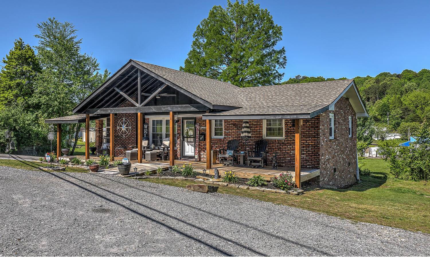 This home has been completely remodeled and what a gem, so close to downtown Ellijay you can bike or walk to the shops and restaurants. This home is zoned C2. The home is just too cute!