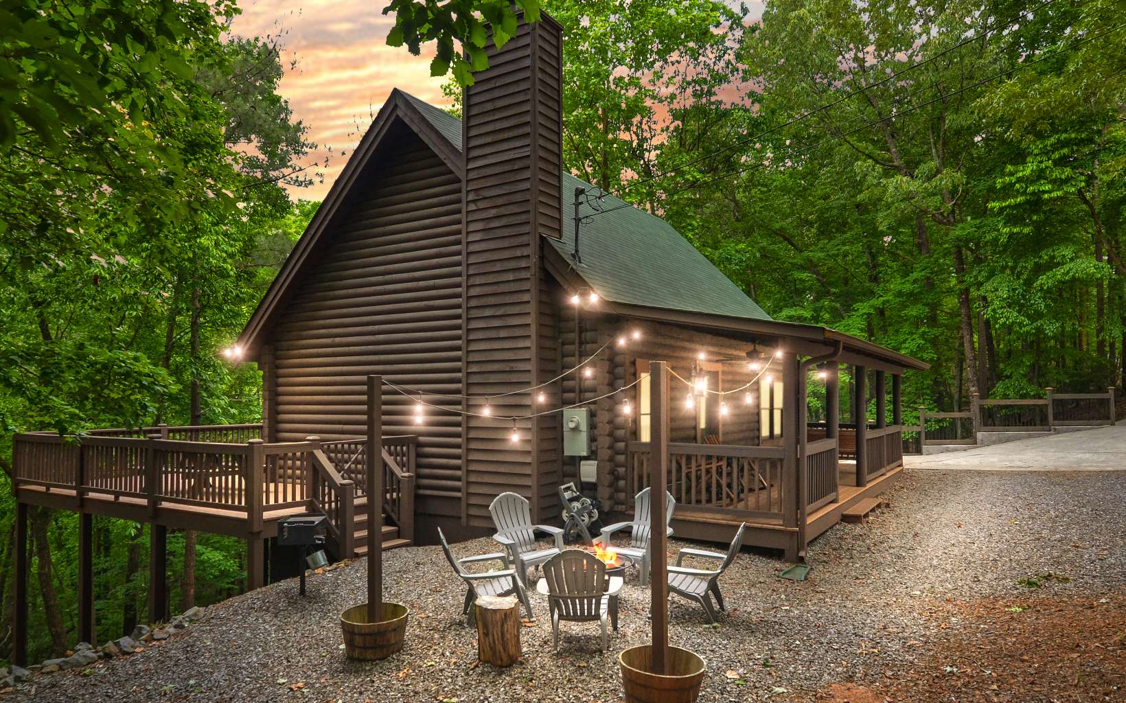 FULLY TURN KEY FULLY FURNISHED REAL LOG CABIN with active short term rental history located in the heart of Ellijay in the highly desired Coosawattee River Resort. This immaculately maintained home is like-brand new! As you enter on the concrete driveway to this lovely 4 BED/3 BATH cabin with real hardwood floors throughout the main level, find yourself in awe of the open concept this cabin has to offer. Relax in the living room on the cozy couches by the stacked stone real wood fireplace or wander into the open concept kitchen with custom wood cabinets and stainless steel appliances! Master conveniently located on the main level with hardwood floors and an extra guest room on the main floor. Wander upstairs to find an additional bedroom with hardwood floors and additional full bathroom. Next, continue down to the full basement for another bedroom and full bathroom and ample space for a movie room, game room or perfect hangout spot. Walk outside to feel instant peace and tranquility at this home with the woods surrounding the property for privacy so you can't see any other homes, the large back deck with a hot tub, the perfect area for entertaining with the large fire pit and chairs set up already and a whole lot of fun waiting to happen! This would make the perfect full time living, part time living or vacation short term rental. See Rental Projection in links and docs.