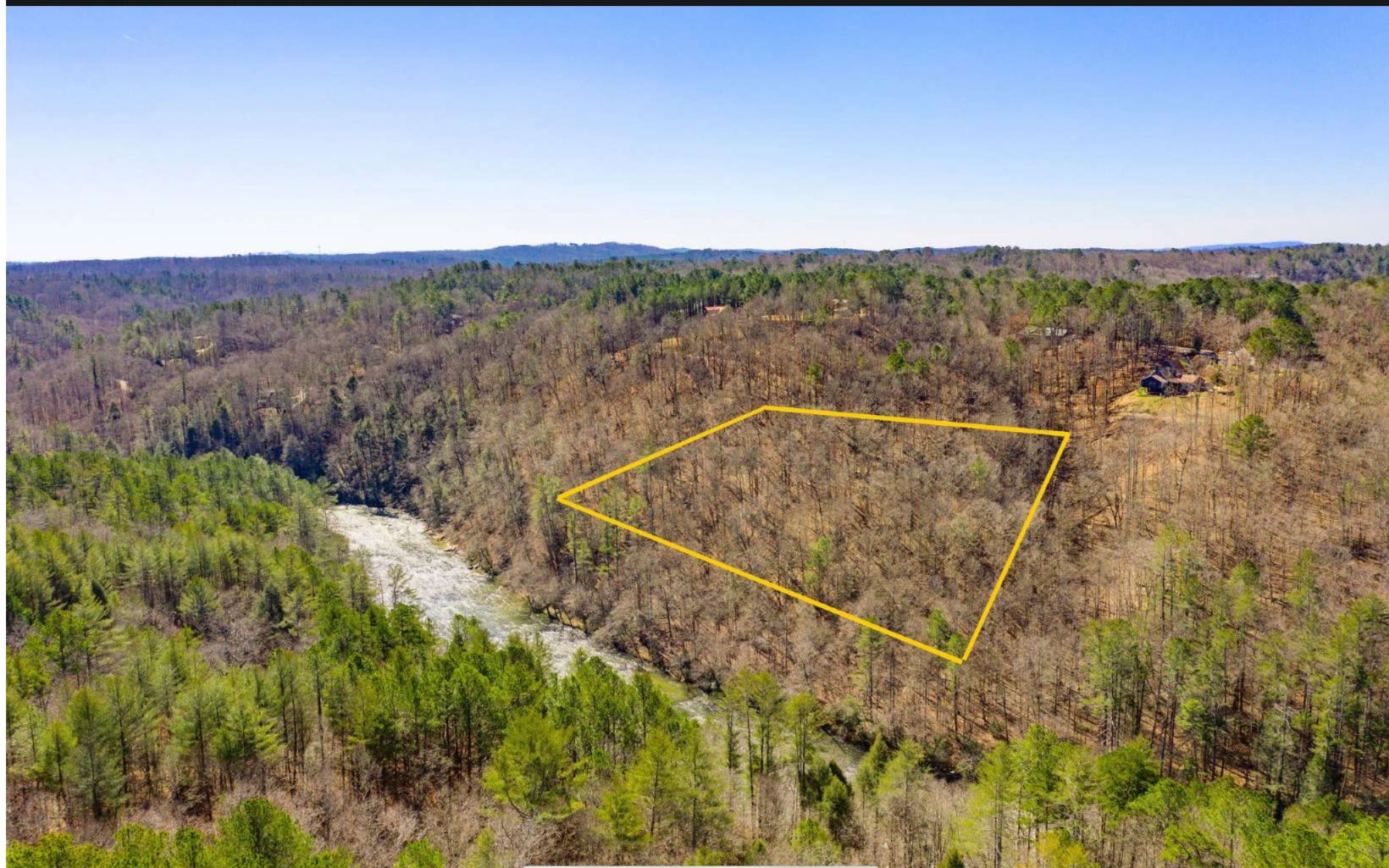 RARE opportunity to own a total of 4 ACRES consisting of two adjoining tracts & multiple build sites, one .87 lot providing access to the much desired Coosawattee River Resort and all the amenities, the other being unrestricted property that allows you deeded access to the Coosawattee River below. Tract 2 contains a 3.14 ac with 4 noisy white water rapids, 605 ft that borders Corp of Engineers property leading into the Carter's Lake Reservoir. Amazing sunsets & sunrises, abundance of wildlife, easy gated access, first class resort amenities and the river in your backyard gives you the best of both worlds.