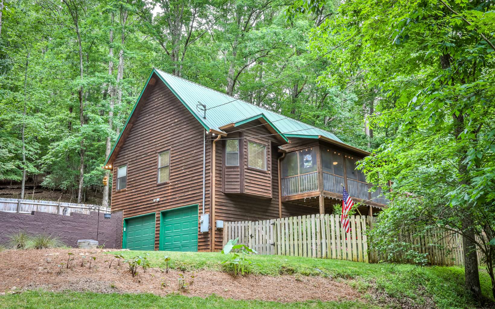 Come to a Tree House Cabin situated near the Coosawattee River, close enough to enjoy river sounds, a beautiful garden, birds chirping, all as you relax on a roomy screened in porch. This 3/3 features, Cathderal Ceilings, Pine floors, Stone Fireplace, granite Kitchen counters, gas range Large pantry and Split bedroom plan on the Main. A Roomy loft provides extra living, while the Spacious Master Bedroom features big windows,a walk in closet, jetted tub and double vanities. The terrace level has a bedroom/full bath, and an extra room for guests, games, a studio, or workspace. Lower level also features a floral inspired patio w/ Fenced in area for pets and a gardening area ready for your inspiration. Top this off w/ a 2 car garage, Plenty of parking, outside fire pit, 2 decks, end of road privacy,all paved roads and easy access. Located in Coosawattee River Resort, with Pools, Fitness center, pickleball courts, tennis courts, the river, trails and much more.