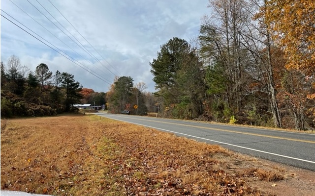 Unrestricted 3.94 acres of land on Hwy 75 North. Unlimited possibilities. Hwy Frontage, Soil test is available. Lake Chatuge is right across Hwy 75 for walking & camping access. Close to Jack Rabbit Mountain biking & hiking trails and conveniently located just minutes from Downtown Hiawassee for shopping & dining, entertainment. Can be divided into 2 individual lots but offered here as one parcel.