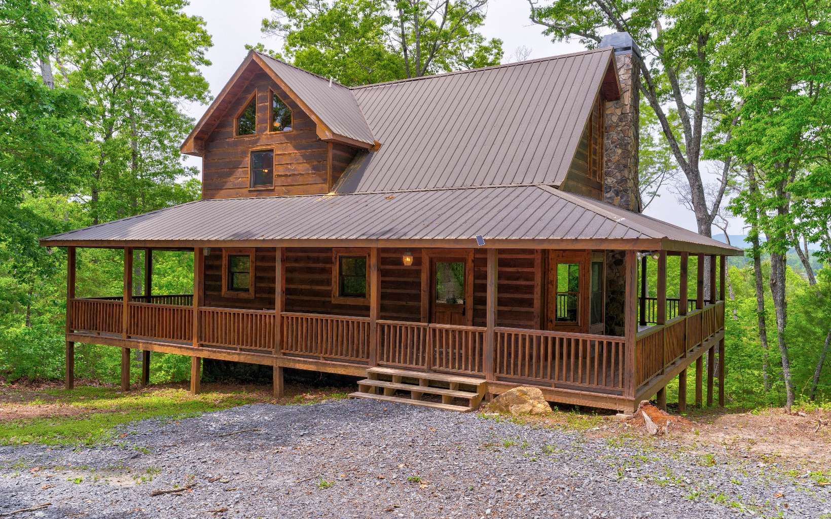 Breathtaking views from this turn-key cabin. Private setting on a cul-de-sac. Minutes to Blue Ridge and McCaysville. Basement was recently completed and includes french doors leading to the hot tub. Wrap around decks to enjoy the serenity and views. Home features 3 bedrooms(one on each level),open concept floor plan with volume ceiling, jetted tub,and exquisite wood details including live edge counters- these are just some of the many upgrades. Activities nearby include wineries, kayaking, tubing, fishing, hiking and much more! Perfect cabin for 2nd home or rental. Fully furnished with separate bill of sale.