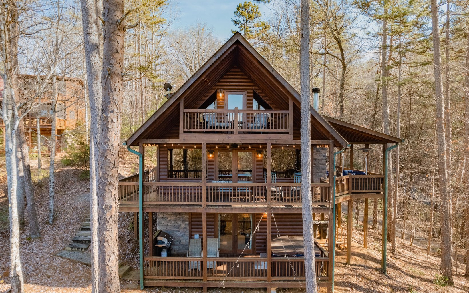 PRICE IMPROVEMENT! Don't miss out on this highly coveted and sought after Aska Adventure Area cabin retreat. Cabin is immaculately maintained and nicely furnished. Property is within walking distance to the Shallowford Bridge on the Toccoa River and all of the fun activities the area has to offer. Activities range from hiking trails, river rapids, dining, gem mining and much more. This spacious cabin will sleep 8 comfortably. Enjoy mountain views, while relaxing in the hot tub or reading a book while chilling on the queen size daybed swing. This cabin literally has it all! Established Rental -with many future dates already booked!