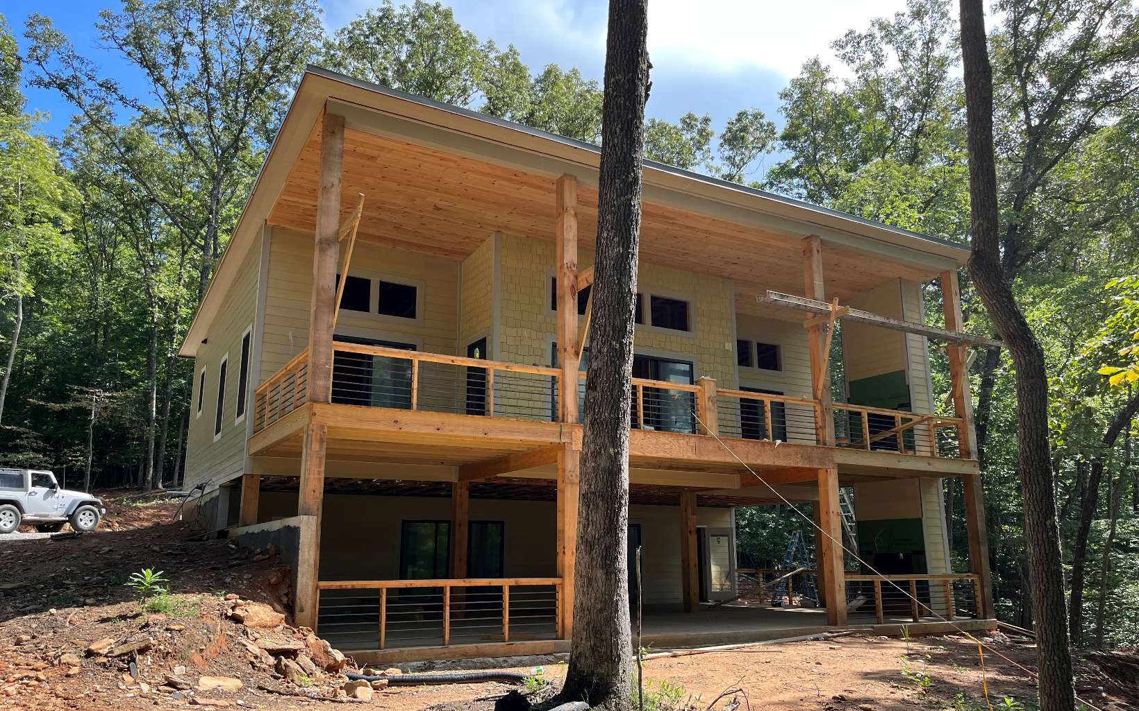Modern mountain living... Searching for that new contemporary plan but haven't found a location that you just love quite yet? Well, look no further. This location is hard to beat! Not only is just minutes from both Blue Ridge & McCaysville, but it’s just a stone's throw from the Toccoa River, too! This new construction will offer the latest stylish finishes, master suite on the main, spacious living area with open floor plan, multiple fireplaces inside and out, and two levels of living.Located in the highly sought after Toccoa Riverbend Estates, this community offers lots of privacy and a beautiful waterside common area on the Toccoa River so you can enjoy kayaking, tubing, and fly fishing on some of the best trophy trout waters in the state of Georgia. Make your way to this masterpiece in the making…