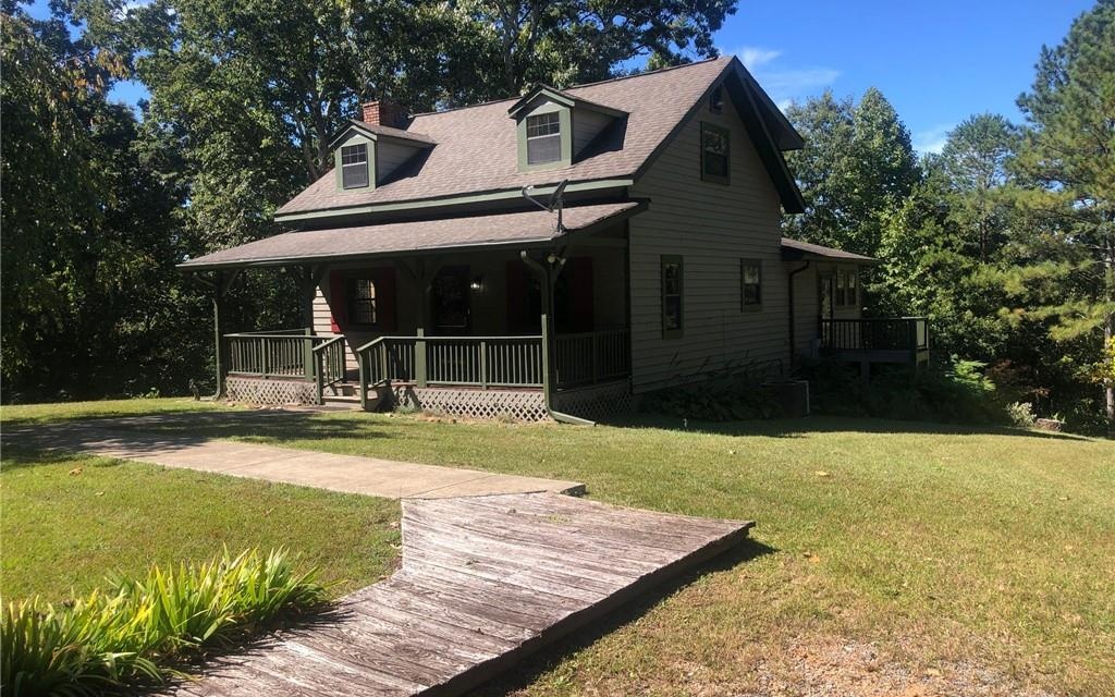 If you are looking for a mountain home this is it. 11.76 wooded acres with plenty of privacy. Rocking chair front porch with a rear deck. Master bedroom has its own deck. Bonus room could be used as a 4th bedroom.