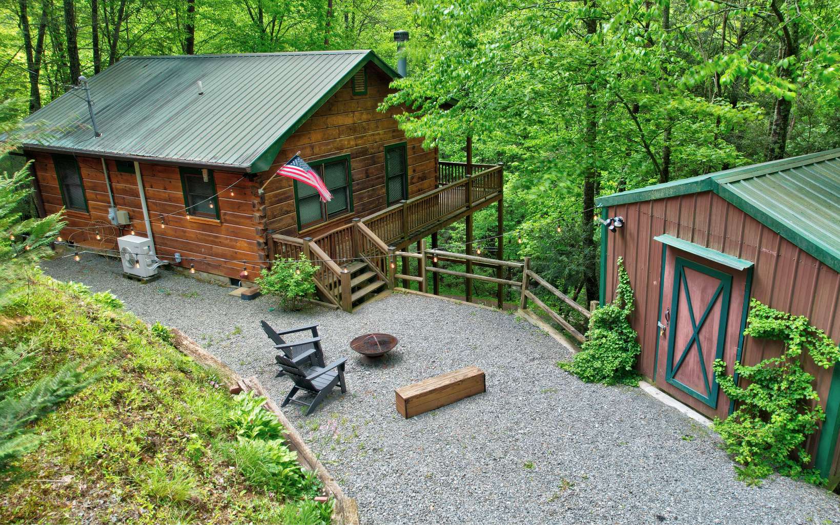 Do you Dream of Sitting on the Porch of your very own Cabin in the Woods, Listening to a Noisy Mountain Stream? This is IT! Cute as a Button and Neat as a Pin. This Fully Furnished, Turnkey Cabin overlooking Noisy Laurel Creek checks all the boxes! So close to Blue Ridge and Ellijay and bordering 200+ ft of the Benton MacKaye Trail. Perfect for Hikers, Nature Lovers, and Mountain Enthusiasts. Immaculately Kept with High End Furnishings, Smart Electronics, and All New Stainless Steel Appliances. You won’t find another Cabin that’s Cleaner or more Updated. Better than New - Everything has been Replaced right down to the Door Knobs, Outlets, and Light Switches. Established, Active Airbnb Property with 5 Star Reviews and 2K Instagram Followers. Ask for List of Upgrades, Too Many to List Here.