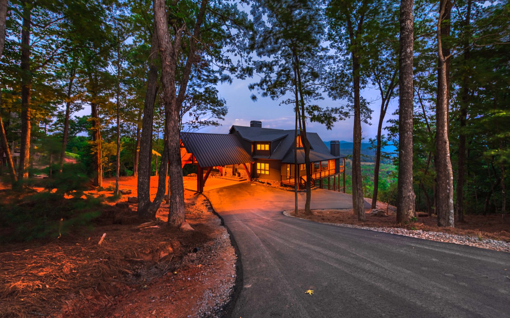 Exquisite mountain home w/ best views in North GA! Meander down private driveway & be blown away by awe inspiring (2 car) porte-cochere w/ 10 foot cedar beams & massive two tiered iron chandelier. Step into impressive iron & glass door & WOW...sensory overload!! The most amazing long range view from every vantage point. Take in the 16 foot ceilings, hand forged iron stair railings, gorgeous stone fireplace (wood burning), & sophisticated chandeliers. The wide open floor plan is very large scale & can accommodate so many guests. The kitchen is a dream; offering lots of cabinet space, Viking appliances, wine cooler, 10 foot party island, gorgeous marble & quartz counters. Just off kitchen is side entrance/mud room which opens to a huge pantry room. Sliders off of the kitchen lead you to a massive outdoor deck w/ fireplace, a hand crafted dining table that seats 12, & the best view in town! The enormous master suite w/ private study (or yoga) room is on main level; master bath is over the top w/ large walk in shower (complete with a view), soaking tub, double vanities & huge closet. Same size master suite can be found on terrace level, along w/ another guest bed/bath. Huge terrace den, bar & tucked away wine & whiskey rooms! Huge upper bunk or rec room. Home just completed staging today: available to show Saturday. Fully FURNISHED. First showings this Saturday July 2nd.