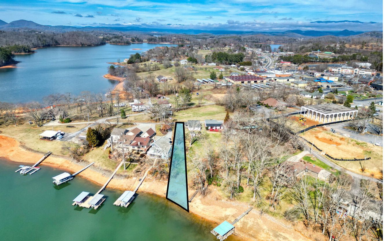 Don't miss out on this INCREDIBLE LAKEFRONT DEEP WATER LOT ON LAKE CHATUGE! AMAZING VIEWS from this Gentle Lot! Best of all you have CITY SEWER and WATER available! Very Minimal Restrictions. Dock Permit on File! A rare find in the City of Hiawassee. Call me before this jewel is gone!