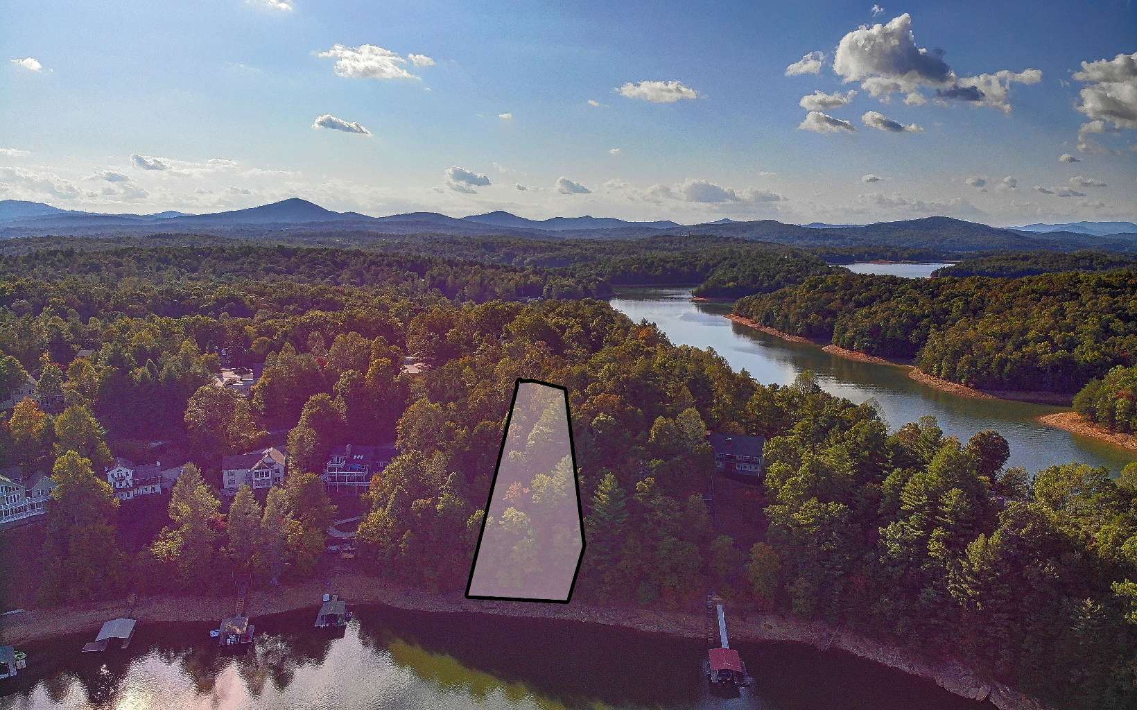 Sought after lakefront lot with deep year round water in Eagle Bend Subdivision. Great view of lake, mountains and Forest Service across the lake making this a rare and pristine view lot. Eagle Bend is a great established community with very nice homes, paved roads and private community boat ramp. Easy Access to Blairsville, Murphy and Blue Ridge. Septic system evaluation on file.