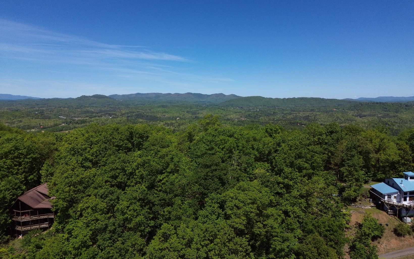 WOW! Hurry before it's too late, this rare ridge-top property is one of the last raw lots on top of Bruce Mountain. This is the true definition of Long Range Mountain views! Come build your dream home and take in the fresh air and breathtaking scene. This property, with a little tree trimming, will offer 180 degrees of undisturbed views.