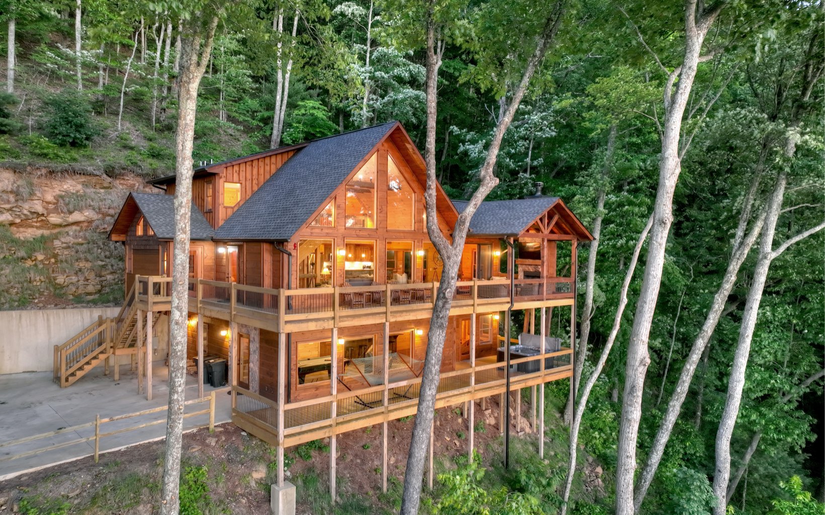 Privacy ,Views, USFS ,and Aska Adventure Area come together in this showstopper North GA cabin!!! This 4/3.5 features impeccable outdoor areas for entertaining with a stacked rock outdoor fireplace , wrap around decks, butcher block counter tops , gleaming wood floors, walls of windows to take in the layered Mountain View’s , chefs delight kitchen and much more . Add in the fact that this established rental comes fully furnished and you have a home run in your cabin wish list . This home leaves nothing to be desired and quality workmanship with every upgrade. The saying says you never know how many friends you have until you have a cabin and owning this successful rental cabin in the North GA Mtns where Lake Blue Ridge, Benton Mackaye hiking trails, Aska Adventure Area, numerous wineries , Blue Ridge Scenic Railway , Merciers famous fried pies, and the Toccoa River will def have you on top of everyone’s bbq invite list.