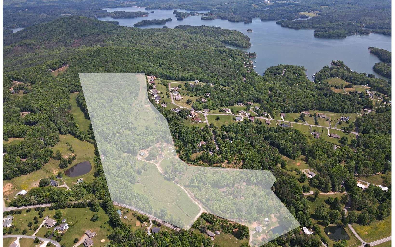 INVESTORS WANTED! Come see this Beautiful 58 acre farm in the heart of the north Georgia mountains. Mountain and lake VIEWS, creek, and a pond, this property is second to none! beautiful 50 mature Chinese chestnut tree orchard, apple trees, blackberries and so many other wonderful plants and trees. It boasts opportunity for the ambitious investor or creative home owner. There are two rustic homes on the property. DON'T MISS OUT!