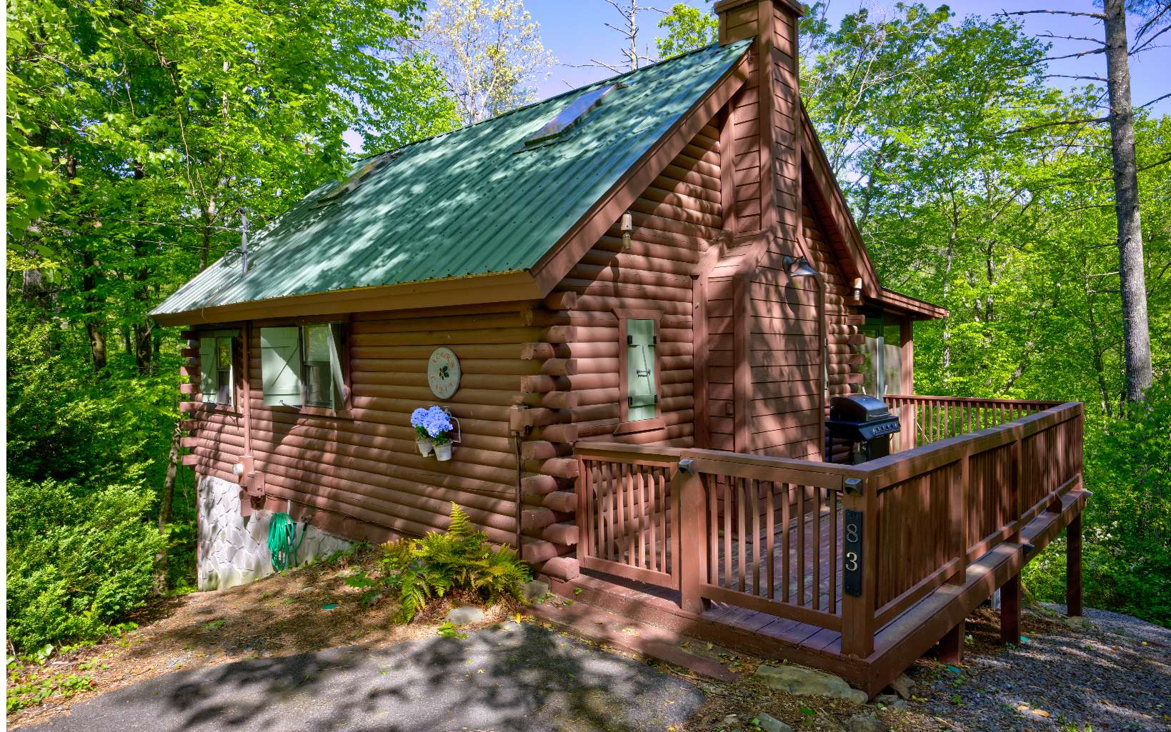 Embark on your next adventure in the Blue Ridge Mountains from the comfort of your cozy log cabin! All-paved access to your private wooded lot, just minutes to Downtown Blue Ridge, Lake Blue Ridge, Toccoa River, Rich Mountain Wildlife Preserve, & Aska Trails. Your family vacations will have everything and more with this charming storybook cabin- highlights include vaulted ceilings, bright skylight windows for additional natural light, hardwoods throughout, a stone fireplace, screened porch, ample crawl space for storing kayaks and paddleboards, a fire pit, and a hot tub! Meticulously maintained and sold fully furnished, this property will not last long! New HVAC system was installed in 2022. Whether enjoying your evening smores around the fire or sipping your morning coffee from the screened porch swing, this cabin combines the perfect blend of nature and relaxation. Located in the heart of the highly desired Cherry Log community, this is the mountain escape you’ve been searching for!