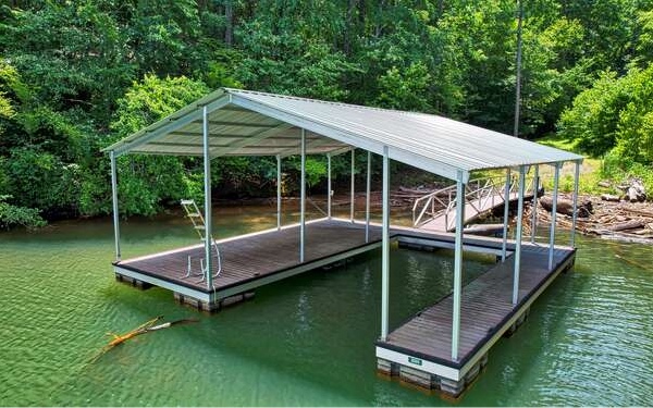 A Rare find- Just under 4 Ac. on Lake Nottely and ready to build your Lakefront home. Minimal Building restrictions (1,000 SF Minimum) Covered Aluminum one slip, swim platform Dock in place, two front corners of lake frontage corners USFS, Septic Approved for 3 bedroom, Power, Water available. Lot offers Desirable hard to find Privacy for Lakefront living.
