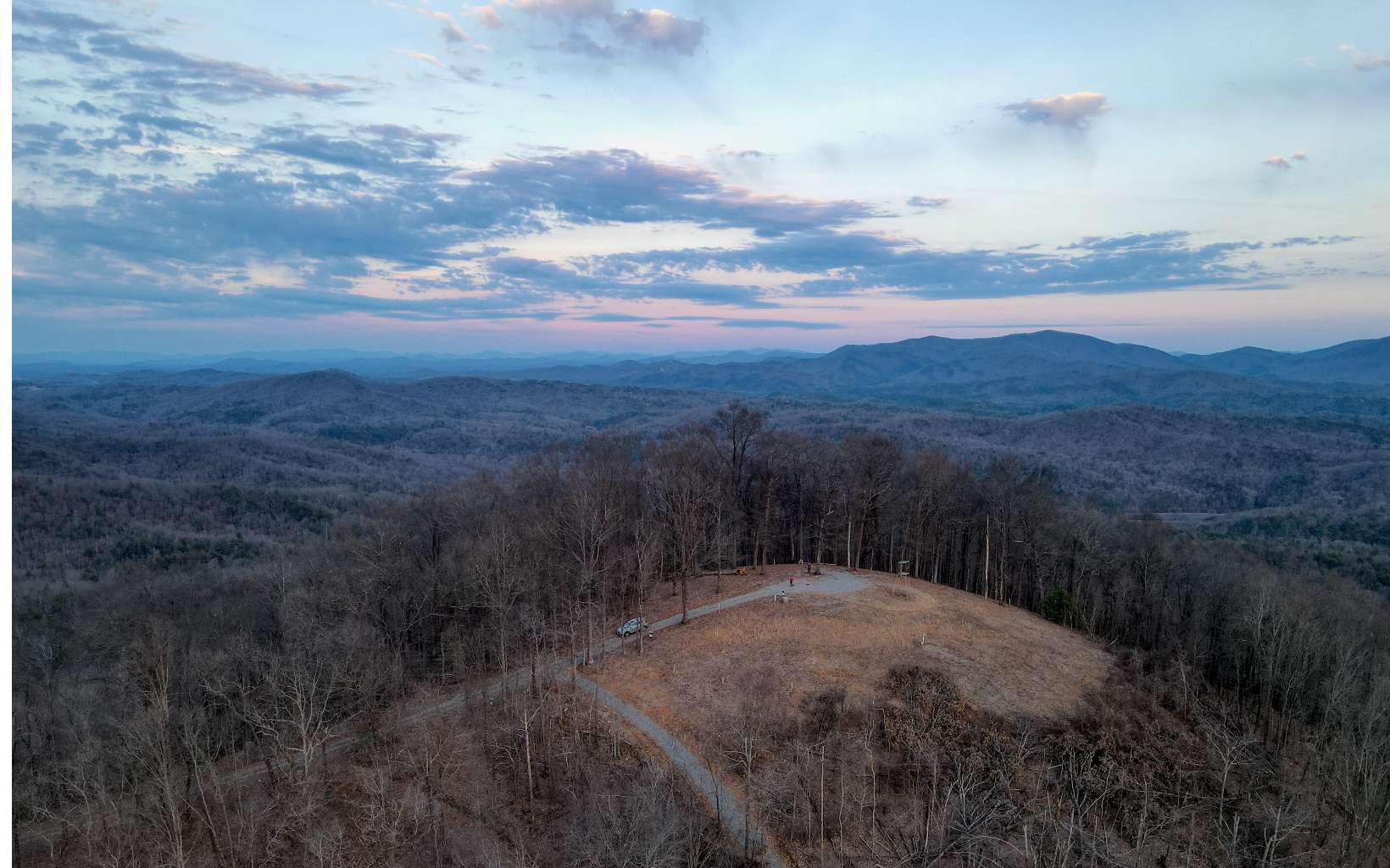 Ready to be wowed with amazing 360 degree views!! This unique 2550 ft elevation lot has 1.49 acres that encompasses the entire top of Double Knob Mountain in the exclusive “Eagles View “ Subdivision. This lot is already cleared for incredible views of the Cohutta Wilderness to the North and the Rich Mountain Wilderness to the South. Underground power, telephone already in place, and a has a new 10 gpm well with excellent tasting Spring water. Lots 5 and 6 are also available. Gate at end of road for added privacy. MUST BE ACCOMPANIED BY LICENSED AGENT TO VIEW PROPERTY.