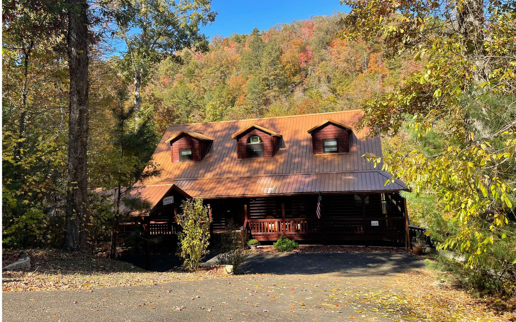 This exquisitely maintained Rustic Lodge boasts over 250 ft of WATERFRONT property in Talking Rock Creek Resort. This home has it all! The main entry/ foyer opens up into a grand living area with fireplace and open kitchen with island. Primary suite with bath, mudroom, laundry/ pantry off of kitchen and another room for office or den area. Upstairs offers another Primary suite with bath, loft with game, reading area overlooking the large living space. The terrace level has 9’ ceilings, separate kitchenette area, another Primary suite with bath, 2nd large living area, exercise, gaming! SO MUCH ROOM, over 4000 sq.ft.! The wrap around porches are a great way to relax and enjoy the most amazing views and sound of rushing water or you can enjoy the very walkable waterfront with fire pit and perfect place to fish, kayak swim and tube in water that leads to the Carter’s Lake area close by where you could dock your boat at the Marina. Less than 90 minutes to Atlanta makes this home the perfect year-round home or weekend getaway! This home is ‘turn-key’ ready for you and your guests. Just a short drive to many local wineries and breweries.