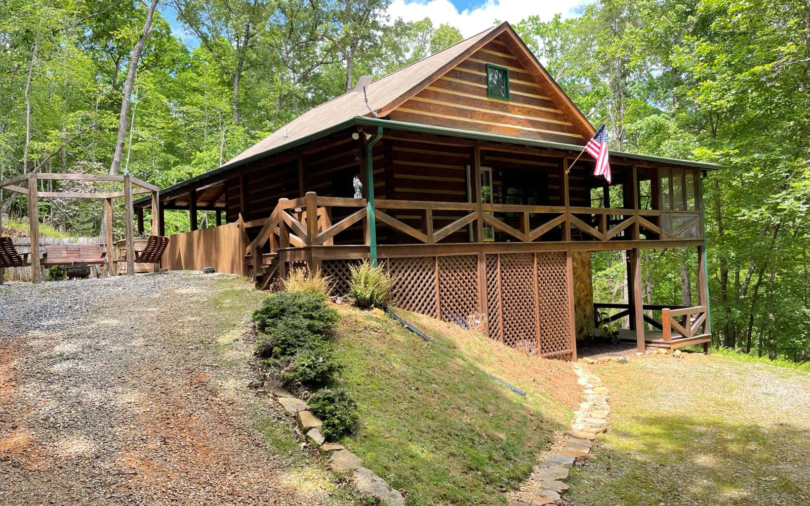 AUTHENTIC LOG CABIN IN THE ASKA ADVENTURE AREA!! Situated on 1.54 private acres with Weeks Creek frontage, this cabin features an open concept design, cathedral ceilings with exposed beams, and a stone fireplace. 3 bedrooms/3 baths...main floor bedroom w/private access to the wrap around deck. Upper level bedroom is open loft with it's own bathroom and an additional sleeping area. The terrace level offers another bedroom with bunk beds and a game room. Outside is the perfect place to relax...the wrap around deck offers plenty of space to unwind after a long day. Or take a stroll down to the creek to enjoy nature at it's finest. Close to all outdoor activities...hiking trails, fishing, USFS land, tubing...and, only a short distance to the Toccoa River. Would make a fantastic private getaway or the perfect rental property...don't miss this opportunity to make your mountain dream a reality!