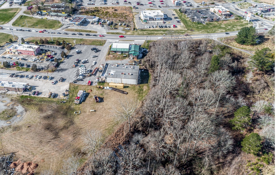 2.63 acres of C-2 Commercial acreage with City Water and Sewer available. High traffic count and Hwy 5 is doubling in size which is great for any business going in. There is an easement giving access to Hwy 5 and Appalachian Hwy. Opportunity is an amazing one.