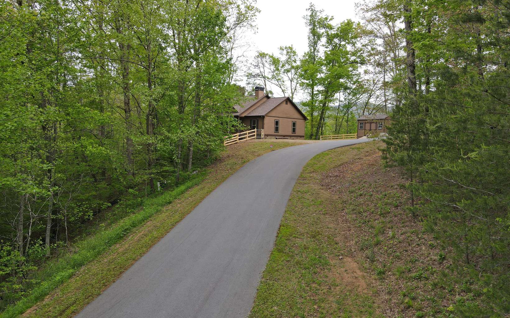 Are you looking for a cabin in the mountains with a VRBO history? Or are you looking for a second home to relax and enjoy the peace and tranquility of the Northeast Georgia mountains? This home has it all! It comes fully furnished; all you have to do is bring your food and clothes. Turn key ready! Brand new fenced front yard for dogs. Fire pit, one level living, game and entertainment room that can also double as and extra sleeping space. Three bedrooms and three bathrooms. Newly poured gravel in the driveway for parking. A shed to store outdoor necessities; kayaks, grills, lawn chairs, lawnmower, ect. Brand new flatscreen TVs! 12 month termite bond transferable. Ring doorbells and light. Almost maintenance free, just pressure washed and cleaned with new filters. Front and back porches with stair access to the house. Walk in crawlspace that is lined! Bear proof trash area, whiskey barrel sinks in the bathrooms, hickory cabinets, granite countertops, knotty pine tongue and groove walls, hickory hardwood floors, hardy plank siding, and much more.