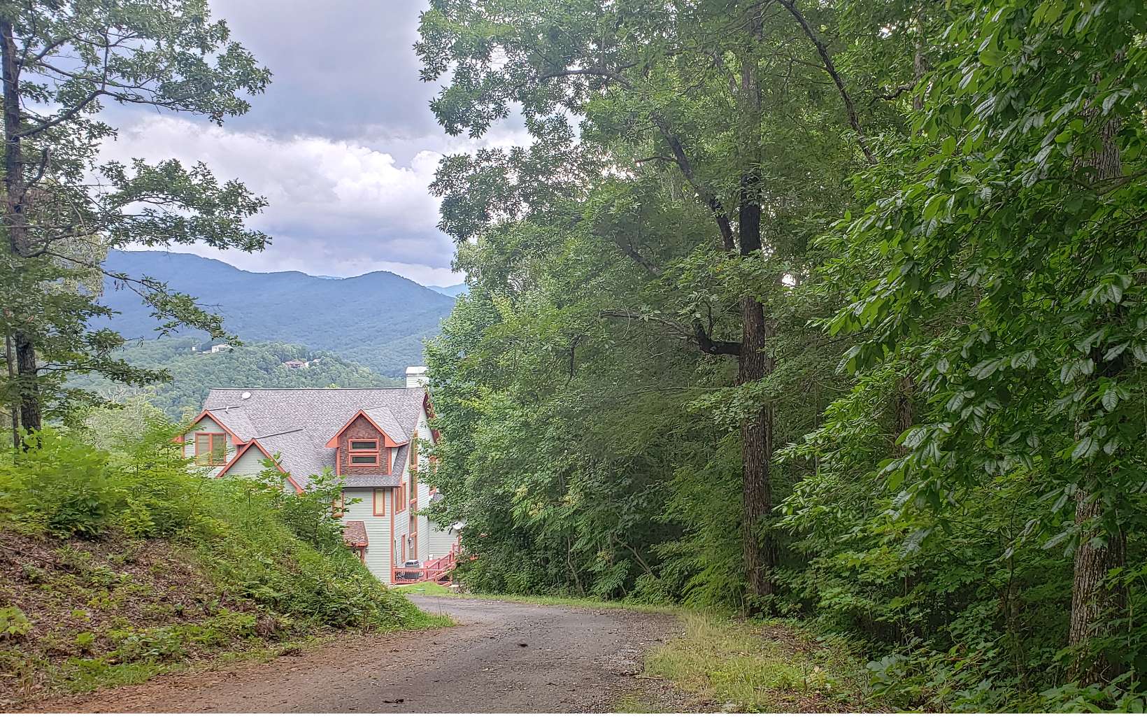 This Premium Lot has Power, Water, & Internet waiting to be connected to your new Mountain Home. This lot is at the top of the mountain with spectacular long range mountain views and a seasonal view of Lake Chatuge!