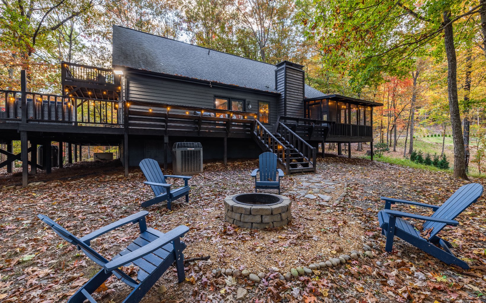 Turn Key Rental Opportunity within minutes from the Brand New Fightingtown Nature Park with well kept biking & hiking trails! Are you looking for an extraordinary Blue Ridge escape that's both luxurious and rustic? Welcome to this one-of-a-kind, newly remodeled mountain home! Boasting a unique experience, you will find gorgeous wood beams in the ceiling and checkered flooring that give it an inviting atmosphere. In this 3 bed, 2 bath open-concept living design you will enjoy plenty of dining and living space perfect for large gatherings, a spacious kitchen for those chef enthusiast with brand new appliances, gorgeous stone fireplace, hardwood floors, tile showers, quality furnishings, whole house generator, laundry room on the main, and an arcade game room that adds an extra layer of fun. With plenty of deck space you can enjoy those stunning seasonal views or make your way down to the expansive outdoor area perfect for entertaining guests. Take advantage of the outdoors with Fightingtown Creek Access - all while nestled in the Laurel Crossing area just minutes from downtown experiences. Whether your ready to move-in or continue its rental income opportunities; it’s truly a winning combination. Don’t miss out on experiencing life in Blue Ridge – it truly is unforgettable!