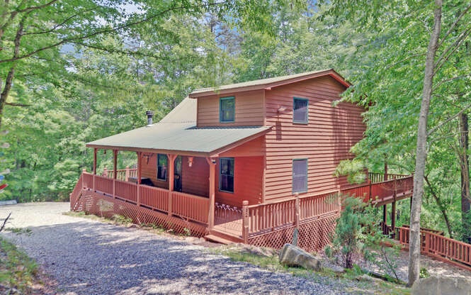 Your perfect cabin, move in ready CABIN in the woods is waiting! Lots of spacious rooms , beautiful mixture of wood and sheetrock, wood burning fireplace, wrap around porches and deck, OUT SIDE firepit area, lower deck, . There is a bonus room in lower level with full bath,(Man Cave) workshop area, garage. Plenty of parking and turn around areas and only 3 MILES FROM TOWN. Hardly used and in great condition. You will want to see this ASAP!