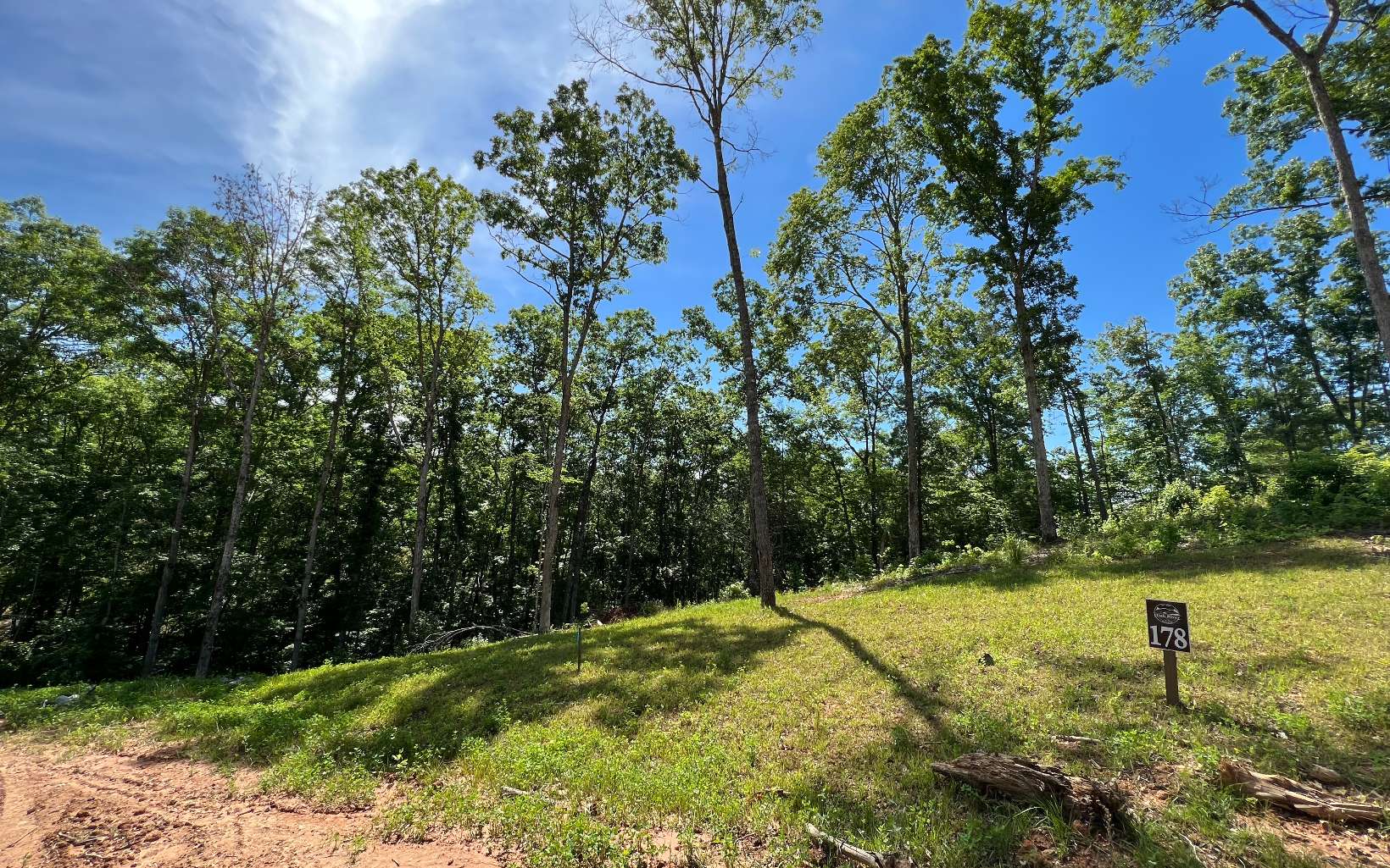 Ready to build your mountain dream home? Well I have the perfect spot for you! This beautiful 3.35 acre lot is located in one of Ellijay's newest and most desirable subdivisions, High River. High River has all paved roads, a riverfront clubhouse, trophy trout stream access, a small lake, parks, and walking trails! Escape to the mountains, just 15 minutes to Downtown Ellijay where there are several places to shop and eat!